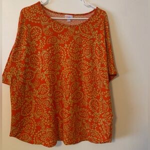 LuLaRoe Orange and Gold Patterned Short Sleeve Top
